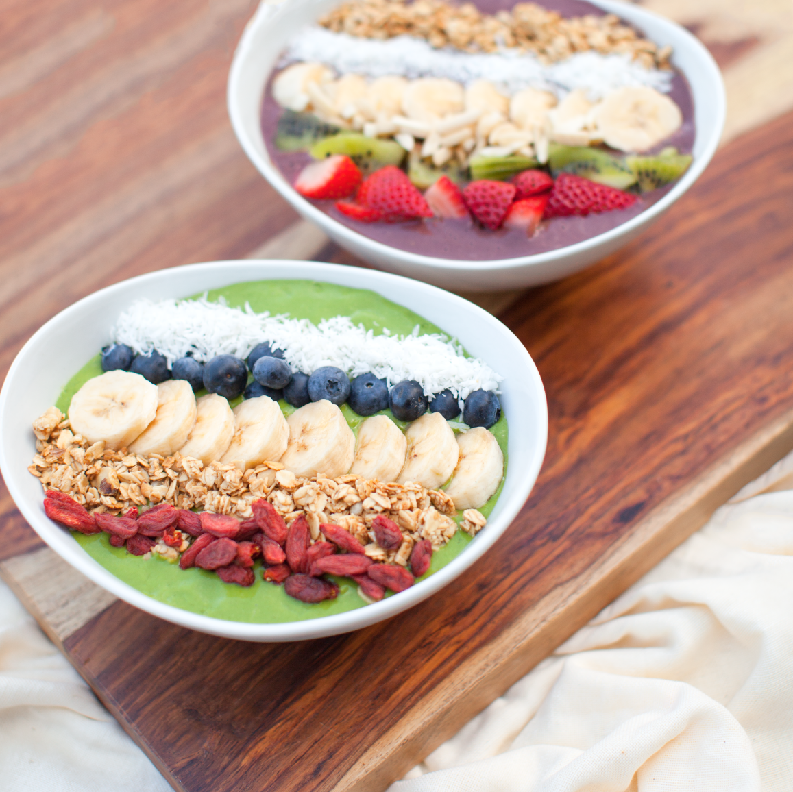 smoothie bowls on wood table