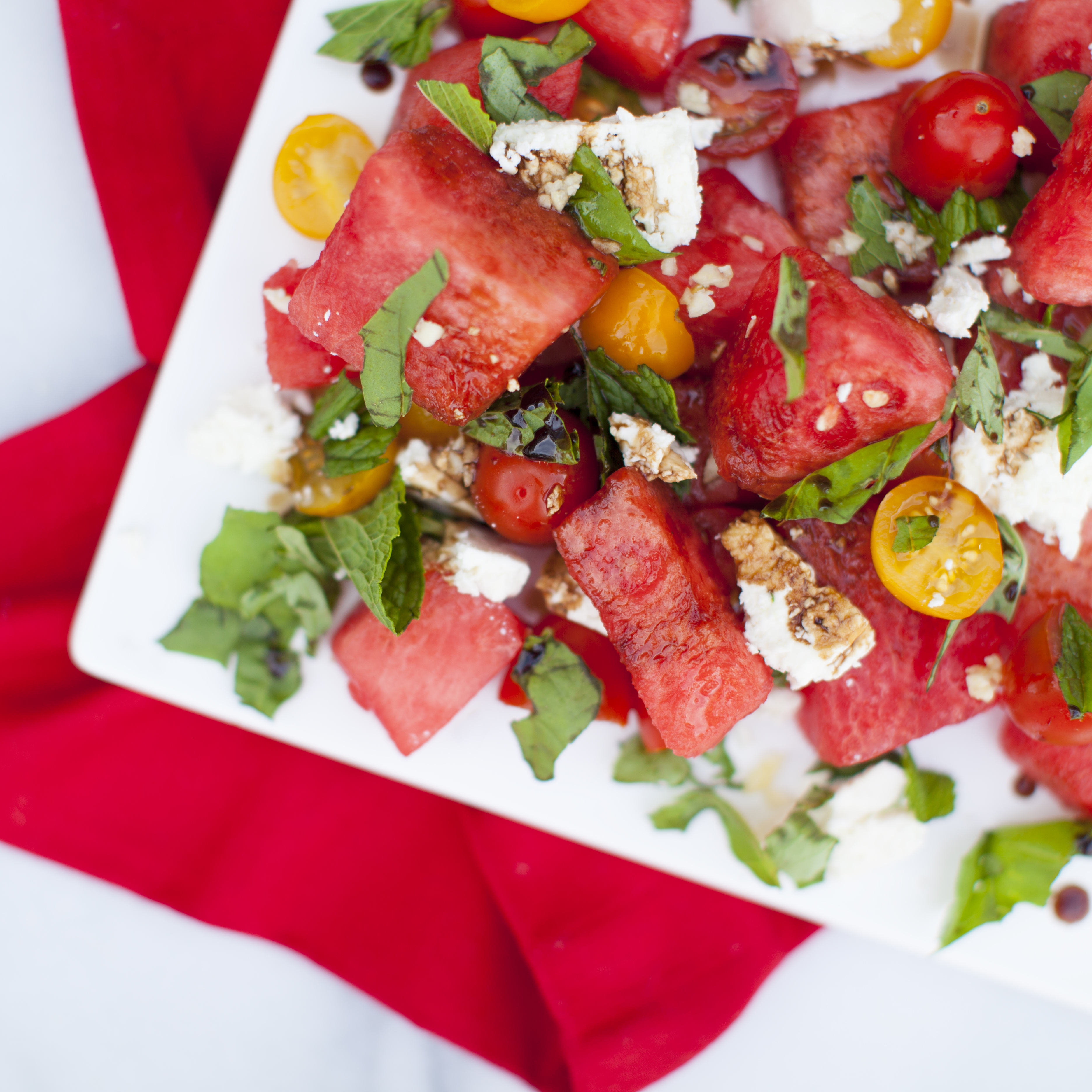 watermelon salad on white plate