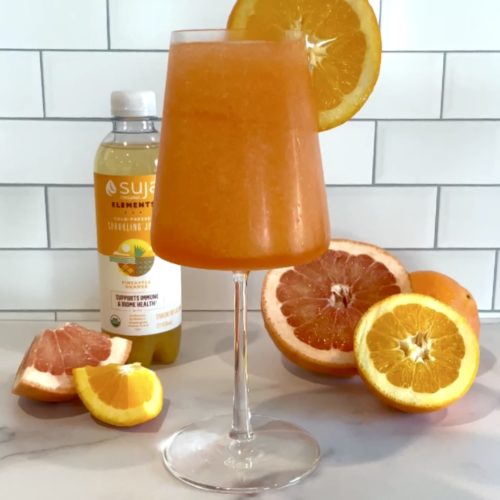 A Suja cocktail with Aperol spritz