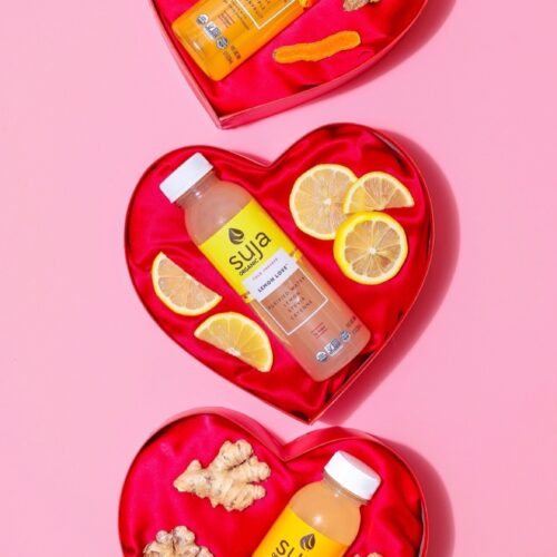 Suja bottles in a heart box